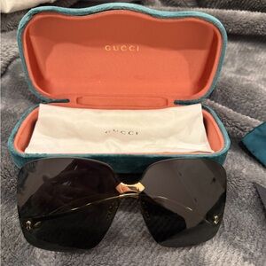 Gucci Black and Gold Sunglasses